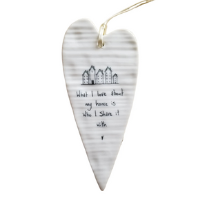 "What I Love About My Home Is Who I Share It With" Porcelain Heart Ornament

2 1/2" W x 5 1/4" H