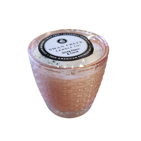 You'll love our cathedral small vase candle. This white peach & clove candle has been poured into a pretty basketweave pink glass.

Rich and high throws of peach and a mild clove note is definitely one of our new favorites.

Filled with 4.5 oz. of American Soybean WaxTM. Measures 3