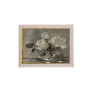 We are obsessed with this little works of art! Three white roses are in a glass vase. You'll find lots of places to put this mini artwork! Printed on premium canvas fabric for a lasting, textured finish and has a handcrafted cream wooden frame with gold dots that adds a classic charm.&nbsp; Comes with a paper backing and hanging hardware for easy installation.

Made in the USA: Proudly crafted with quality and care.&nbsp;

Care Instructions: Keep canvas dry to maintain its quality. If smudged or dirty, gent
