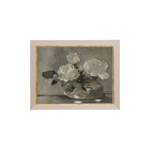 We are obsessed with this little works of art! Three white roses are in a glass vase. You'll find lots of places to put this mini artwork! Printed on premium canvas fabric for a lasting, textured finish and has a handcrafted cream wooden frame with gold dots that adds a classic charm.  Comes with a paper backing and hanging hardware for easy installation.

Made in the USA: Proudly crafted with quality and care. 

Care Instructions: Keep canvas dry to maintain its quality. If smudged or dirty, gent