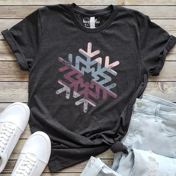 You'll love this soft gray tee with a pink, blue, purple and grey snowflake in the center!        Printed direct-to-fabric printing for a soft design that won't crack or peel. Shirts are soft Bella and Canvas unisex fashion fit tees that fit like a well-loved favorite, featuring a crew neck and short sleeves.

100% Airlume combed and ring-spun cotton.

Made in the United States