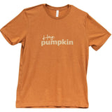 Welcome in the Autumn season with the playful Hey. Pumpkin t-shirt! This soft poly-cotton blend tee comes in heathered orange color with white wording. It reads ‘Hey, pumpkin’ in white script and text. The word ‘pumpkin’ sports a leopard print design for a unique spin on an Autumn favorite phrase. This tee will look lovely alone or with your favorite flannel or cardigan.