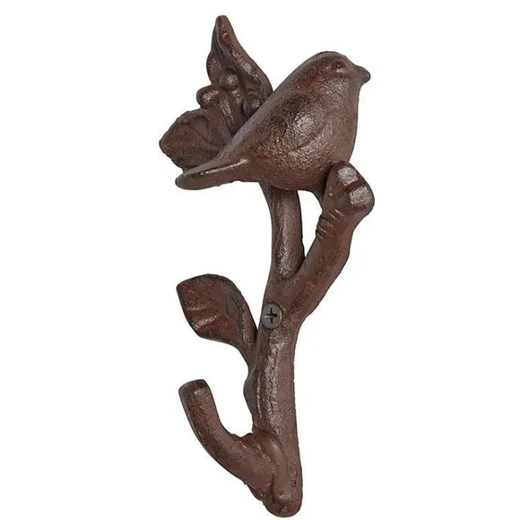 This sweet cast iron bird is perched on top of a branch, ready to hold something you'd like to hang on it!  Cast Iron  Spot clean only  Approximately 1.5″D x 3.9″W x 6.5″H