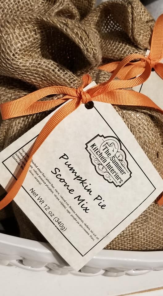 burlap bag with an orange ribbon holding a tag that says Pumpkin Pie Scone Mix