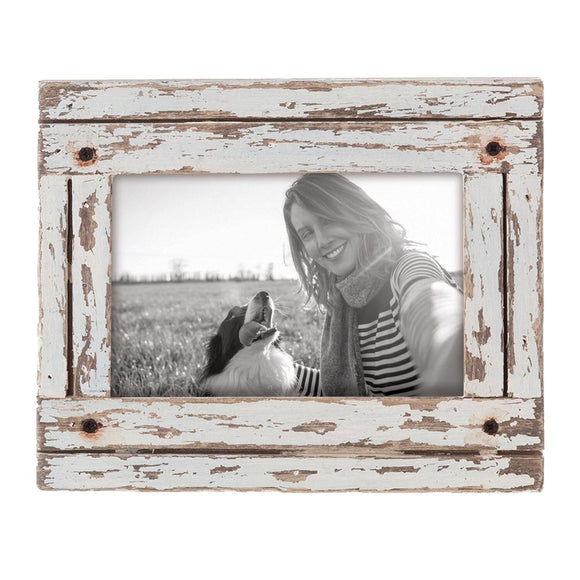 This is one of our most popular items!  Instantly add cozy charm to any space with this distressed wooden frame with its whitewashed finish and black accent crews in the corners. It will fit a 4X6 photo and can sit horizontally or vertically depending on your picture.