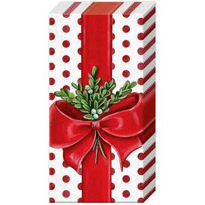 These pocket tissues have a white background with red polka dots  "tied" with a big red ribbon with a sprig of boxwood and berries in the bow.  These make the BEST gifts!   4 PLY - 10 paper tissues per package  4" X 2"   Made in Germany