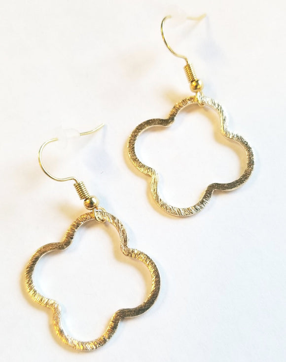 These simple gold earrings are in a beautiful quatrefoil shape! They are the perfect earrings to wear every day and they make a wonderful gift.