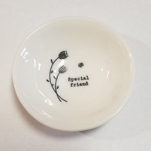 These porcelain trinket bowls are perfect to put your rings in at night, or to put your tea bag or snap mesh ball into when you are done steeping your tea!  "Special Friend" is printed on the right side of a sprig of flowers inside of the bowl.  3/4" H x 2 1/2" Dia