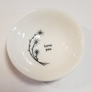 These porcelain trinket bowls are perfect to put your rings in at night, or to put your tea bag or snap mesh ball into when you are done steeping your tea!  "Love You" is printed on the right side of a sprig of flowers inside of the bowl.  3/4" H x 2 1/2" Dia