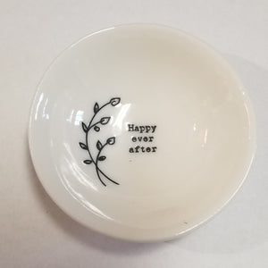 These porcelain trinket bowls are perfect to put your rings in at night, or to put your tea bag or snap mesh ball into when you are done steeping your tea!  "Happy Ever After" is printed on the right side of a sprig of flowers inside of the bowl.  3/4" H x 2 1/2" Dia