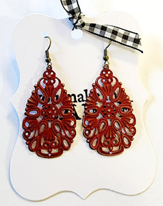 This is one of our favorite earrings, the perfect size and style for any outfit!  1-3/4" L by 1"W  with a 2.5" drop length from the top of the wire to the bottom of the earring.  Painted color in cherry and distressed