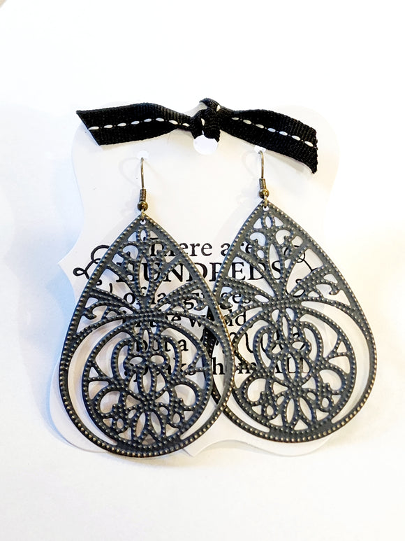 A customer favorite! The hand-painted zinc finish on our earrings is slightly distressed, revealing the antiqued bronze beneath.  3