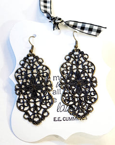 Wouldn't it be lovely to wear these beautiful earrings?  1/34" by 7/8" with a 3" drop length on kidney wire.  Painted color in black and distressed