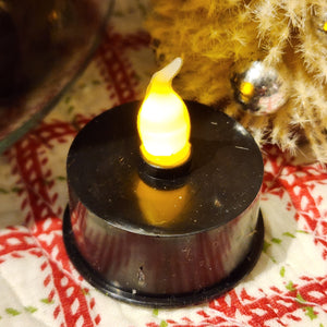 This black-based tea light is perfect to give a little glow wherever you need it!  It has a timer, so when you turn it on it will stay on for 8 hours and turn off and will turn back on the same time you turned it on the next day!