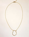 This necklace is stunning!  An organic circle necklace with cut white zircon in polished brass is attached to the adjustable 16"-17.5" chain ~ beautiful!  Made in India