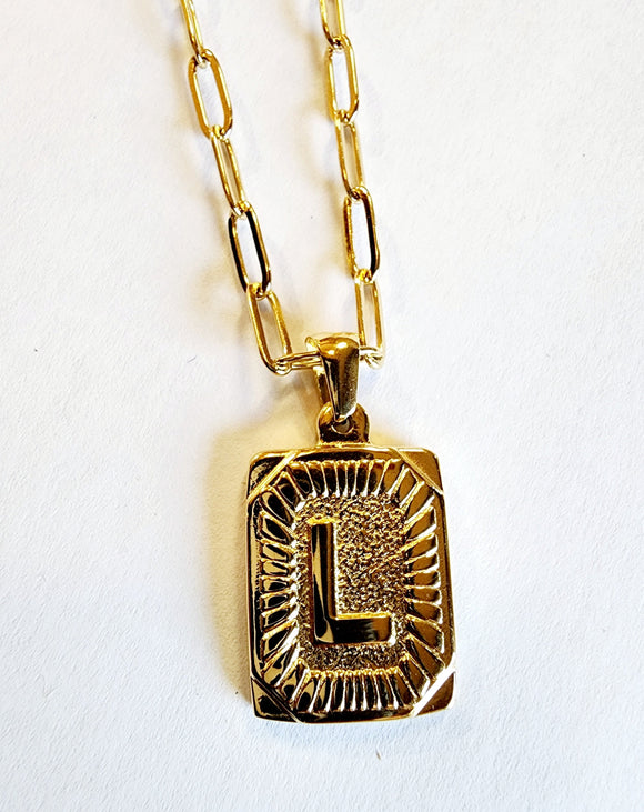 These initial necklaces are one of the hottest looks for this season!  Gold-plated rectangle initial charm with the letter 