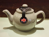 6 cup Sage Green Teapot. When it's time for a spot of tea, reach for one of our stoneware teapots, which can absorb the heat of boiling water without cracking. Likewise, the beautiful exterior is protected with a gloss to prevent the paint from warping or rippling. The classic bulbous shape allows tea leaves or bags to move freely for just the right amount of flavoring.