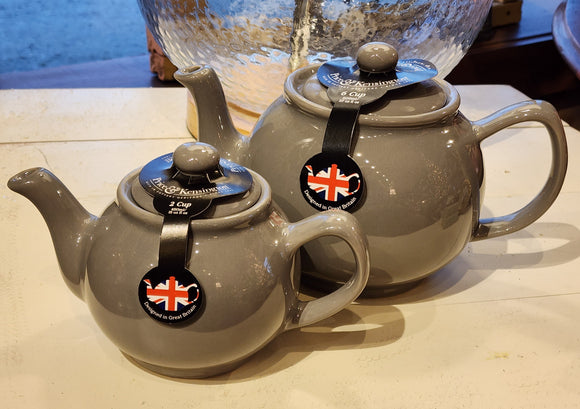 When it's time for a spot of tea, reach for one of our stoneware teapots, which can absorb the heat of boiling water without cracking. Likewise, the beautiful exterior is protected with a gloss to prevent the paint from warping or rippling. The classic bulbous shape allows tea leaves or bags to move freely for just the right amount of flavoring.   Our Charcoal teapot is available in 2-cup or 6-cup size