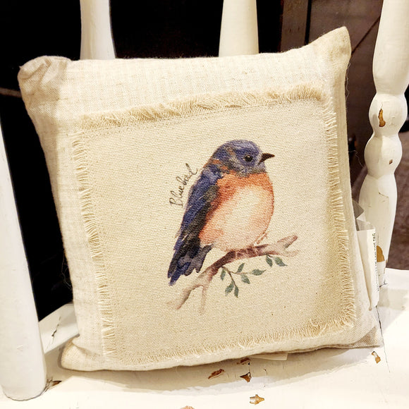 We love these sweet miniature pillows because they fit anywhere! The little bluebird is printed on a muslin fabric that has been sewn onto a cream-striped ticking fabric.   8