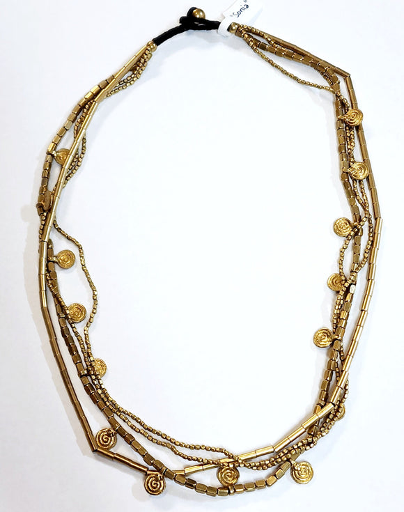 Now here is a gorgeous layered brass necklace!  The first layer is two small beaded strands, the second layer is beautiful long brass beads, and the final layer is rectangular beads with circle disc charms spaced apart.  This will be your go-to necklace! The hook is a brown cord with a brass bead that goes through the loop to close around your neck.  23