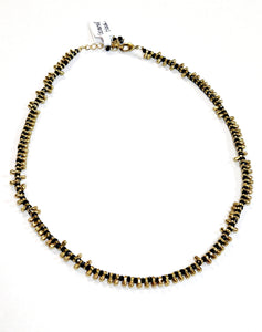 A great necklace to wear with anything! It has alternating brass toggled beads and black beads, creating a beautiful design. This 17" necklace has a 1" adjustable chain and can be made 18" if needed ~ perfect for layering!  Handmade by a young designer and team of artists in Northern India