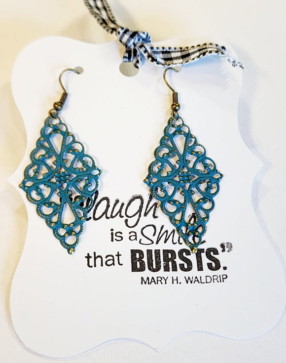 You'll love these dainty & lightweight earrings ~ you won't even feel them on. They are so light!  The diamond shape has a beautiful filagree pattern that will get compliments!  Hand-painted in a nordic teal color and distressed. Lead-free, Nickle free  Approximately 2.5