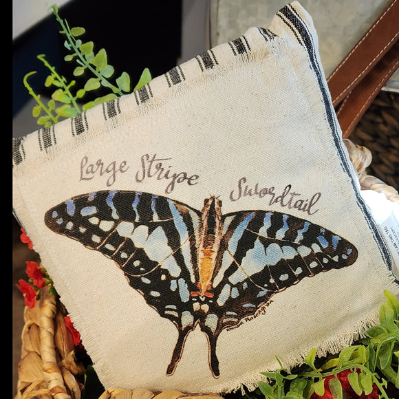 We love these sweet miniature pillows because they fit anywhere! The little Striped Swordtail Butterfly is printed on a muslin fabric that has been sewn onto a black-striped ticking fabric.   8