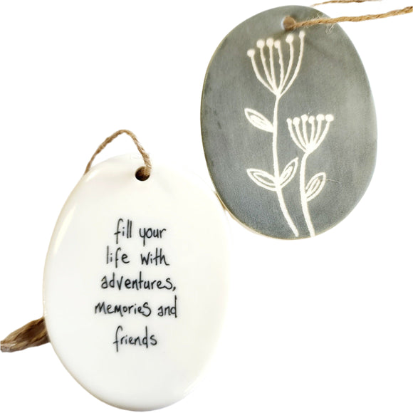 We love our porcelain ornaments because they are perfect for gift-giving! This oval ornament says, 