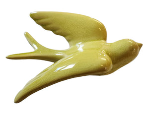 One of our absolutely favorite items in the store is our hanging ceramic birds with a crackled antiqued finish.  Whether you hang one or six of them, they are sure to bring a pop of color and whimsy to any room!  5" x 2" x 6"t  Chartreuse