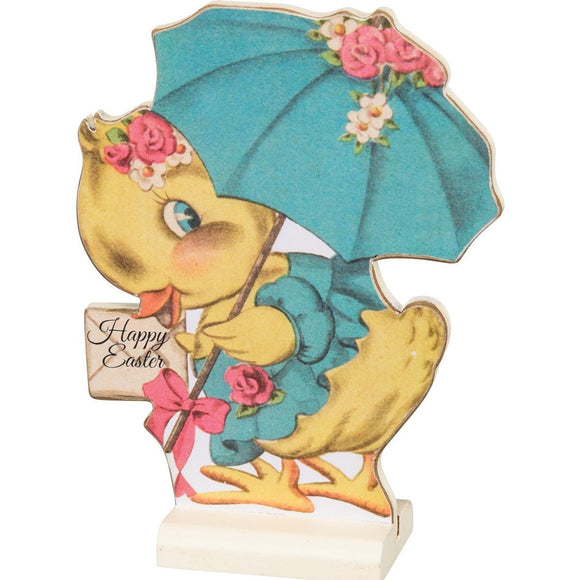 This little vintage-inspired wooden chick looks adorable with her blue dress and matching umbrella.  She is carrying an envelope that says 