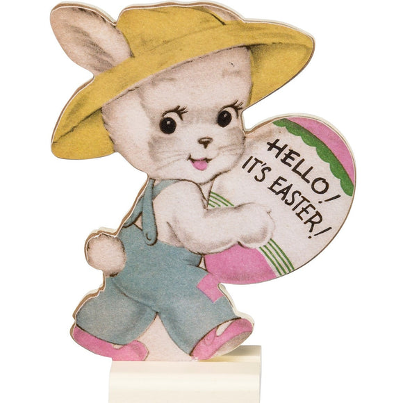 This Little vintage-inspired wooden bunny is holding an egg saying 