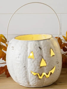 You'll love this adorable smiling Jack-o-Lantern!  It has a handle so it can be carried around or just sit in a cute spot for you to see him every day!  Use it to put your candy in for your trick-or-treaters, or stick one of our LED flickering candles in it for some Halloween ambiance!  9.5" H x 10.5"  *Due to the size of this pumpkin, it is available for store pick-up only