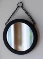 You'll love the simplicity of this black mirror! The matte black metal edging around the mirror is finished with a black metal chain creating a refreshing spin that will be a great addition to your home! Mirror 5.5" w x 5.5" h  Chain 3" Drop for a total of 8.5" height