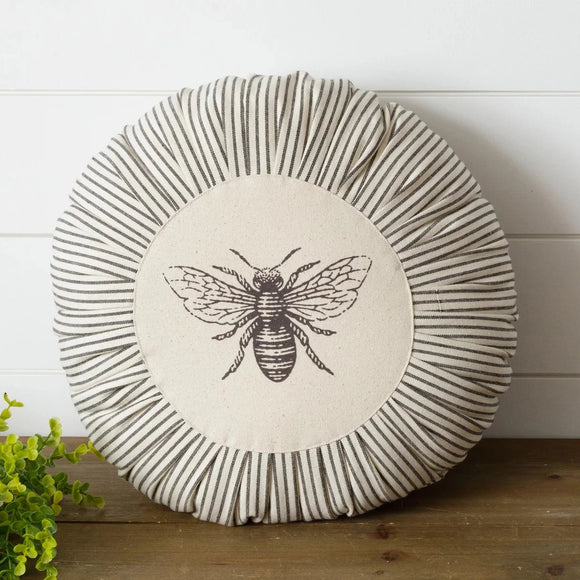 This adorable pillow will have everyone BUZZING! Its cream background shows off the black bee in the center with the black & cream ticking fabric pleated all around. It looks great alone or with other pillows!  14