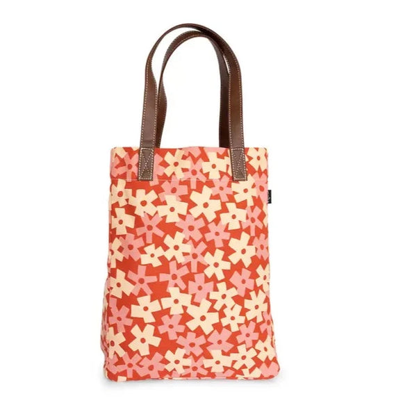 Now, THIS is a print to cheer about!  We are loving this pink and white block floral print all over a red background! It will create a statement wherever you go! All of our bags are printed on recycled canvas with eco-friendly pigment inks. Our canvas totes are soft yet durable and an easy carry-all. Not just for the market. This streamlined tote features an interior strap and hooks to attach our pouches. 