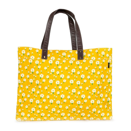 These sweet daisies on a yellow background make such a cute & happy print! Our carryall tote makes a great bag to take to the beach, class, or to the gym. This roomy utility tote features 3 interior pockets, and a strap and hook to attach our pouches. The waterproof lining makes cleaning a breeze. Jackpot!  Care Instructions: Spot-clean gently as needed  18