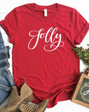 Santa isn't the only one who is Jolly!  Be Jolly this holiday season in this beautiful red t-shirt with white writing. These are so soft & comfy that you will love wearing them to get-togethers, shopping, or just running around doing errands. The styling possibilities are endless. Roll up the sleeves, tie a side knot, front tuck, or wear it while lounging around the house. We guarantee that you will love this shirt's fit and softness.
