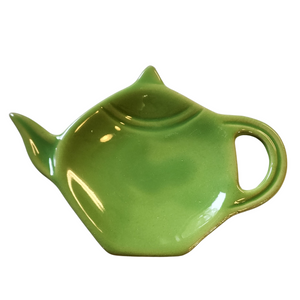 Get one of our cute retro-inspired teapot-shaped tea bag holders to help keep the drips from your teabags from going anywhere!  Green, single glaze lead-free ceramic ware.  Approximately 5" w x 3.25" h