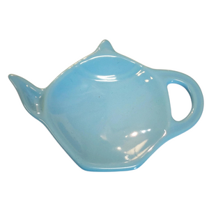 Get one of our cute retro-inspired teapot-shaped tea bag holders to help keep the drips from your teabags from going anywhere!  Turquoise color, single glaze lead-free ceramic ware.  Approximately 5" w x 3.25" h