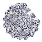 This quilted placemat brings happiness to your home with a gorgeous floral paisley design in denim on a white background with touches of yellow. It reverses to a denim block print with yellow floral designs on top of a white background. It will easily brighten any tablescape. Finished with a scalloped edge, this tabletop collection is crafted of 100% cotton and hand-guided machine quilting.  Machine wash cold and tumble dry low for easy care.  17"L x 17" W x 0.3" H