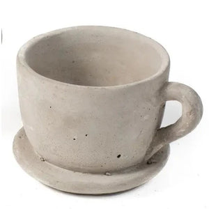 This large hand-cast cement teacup will be the cutest indoor or outdoor accessory this year!  Stick succulents or air plants in them for a bit of green!   5" L x 4" W x 3.125" H