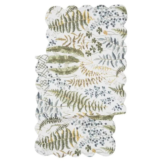 This beautiful quilted runner will bring happiness to your home with a gorgeous botanical design in greens, blues, and gold on a white background. It reverses to a green geometric design on top of a white background. It will easily brighten any tablescape. Finished with a scalloped edge, this tabletop collection is crafted of 100% cotton and hand-guided machine quilting.  Machine wash cold and tumble dry low for easy care.  14