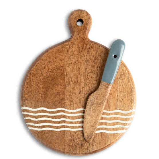 Set the table in style with this mini wood serving board with a beautiful wavy design along the bottom. Included is a wooden spreader with a slate-colored handle. It is fun to serve your favorite cheeses or munchies or as a fun gift idea for a new homeowner.  5